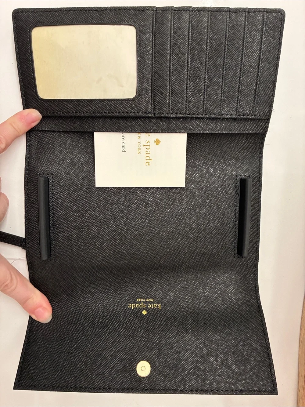 kate spade Black Saffiano Fold-Over Wallet with Gold Logo